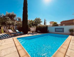 Maisons de vacances Maison de campagne avec piscine-jardin-wifi : photos des chambres