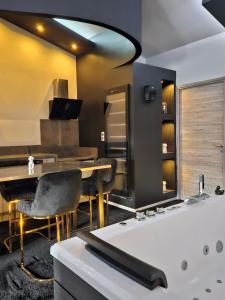 Appartements Love Room Le Jardin D-Eden : photos des chambres