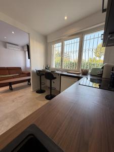 Appartements Gourmet studio - charm & comfort : photos des chambres