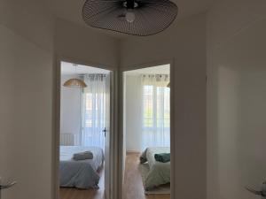 Appartements Ideal en famille ou entre amis - Grand T4, vue degagee, parking prive, proche centre-ville, metro Borderouge a 5min : photos des chambres