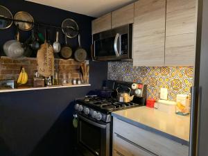 Airy brownstone penthouse duplex near Central Park