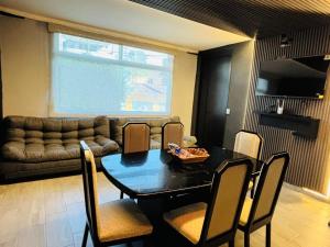 Depa Frente al aeropuerto hasta 12 Huéspedes