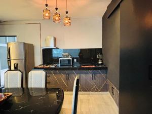 Depa Frente al aeropuerto hasta 12 Huéspedes