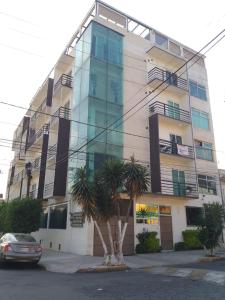 Depa Frente al aeropuerto hasta 12 Huéspedes