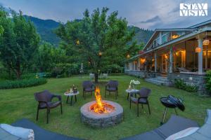 StayVista at Mayflower Aramgarh in middle of Orchards with Lawn, Bonfire, BBQ