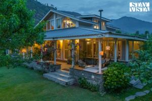 StayVista at Mayflower Aramgarh in middle of Orchards with Lawn, Bonfire, BBQ