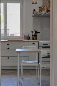 Appartements La Kase Dali jolie maison de ville avec jardin : photos des chambres