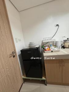 Green 2 SMDC - STUDIO TYPE Condo - Gems Suite Staycation