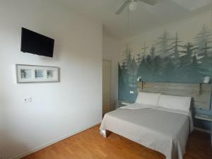 Chambre Deluxe (1 Adulte + 1 Enfant)