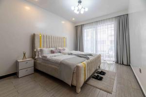 spacious executive one bedroom apartments with breathtaking city views swimming pool ,well equipped gym ,child playground and ample parking space