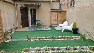 Maisons de vacances Charmante petite maison proche de la gare : photos des chambres