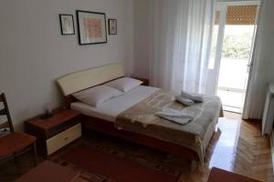 Holiday house with a parking space Banjol, Rab - 24620