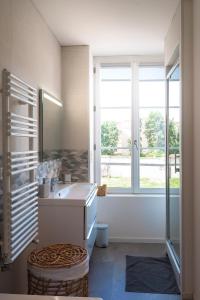 Appartements Epernay Prestige, Appartement avec terrasse : photos des chambres