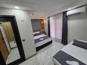 Superior Triple Room room in Poyraz Hotel
