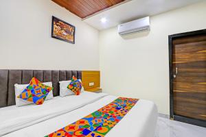 FabHotel Dharani Grand - Nr Mamata Medical College