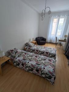 Appartements 75m2 - 2min centre pieton & 10 min de la gare : photos des chambres