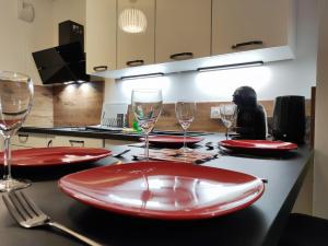 Appartements L-AuthentiCite, jardin et parking au centre-ville : photos des chambres