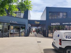 Appartements L-AuthentiCite, jardin et parking au centre-ville : photos des chambres