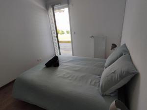 Appartements L-AuthentiCite, jardin et parking au centre-ville : photos des chambres