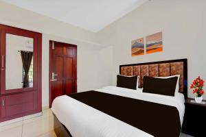 [Day Stay - 8 AM to 8 PM] Hotel O Valiyavila Bus Terminal
