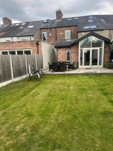 Victorian house with cricket ground views