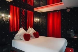 Appartements Le Cabaret Vip SPA : photos des chambres