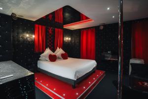 Appartements Le Cabaret Vip SPA : photos des chambres