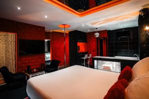 Appartements Le Cabaret Vip SPA : photos des chambres