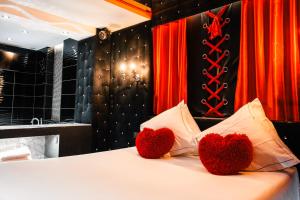 Appartements Le Cabaret Vip SPA : photos des chambres