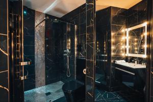 Appartements Le Cabaret Vip SPA : photos des chambres