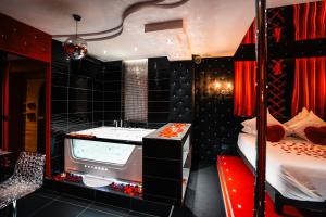Appartements Le Cabaret Vip SPA : photos des chambres
