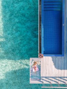 Radisson Blu Resort Maldives with 50 percent off on Sea Plane round trip 03 nights & above