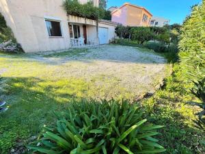 Appartements Bas de villa proche de toute commodites : photos des chambres