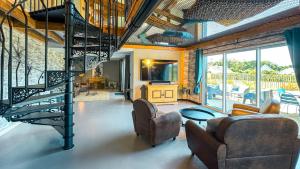 Villas Loft haut de gamme avec jacuzzi a Trelevern : photos des chambres