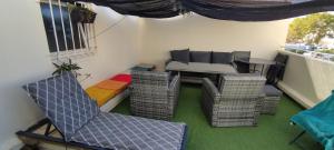 Joli appartement avec grande et belle terrasse, au pied de la plage du Grazel!