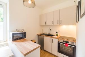 Appartements Studio pratique & cosy - centre de Guingamp : photos des chambres