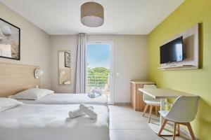 Appart'hotels Residence Odalys Les Oceanides : photos des chambres