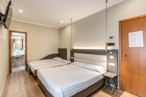 Quadruple Room room in Flower Garden Hotel