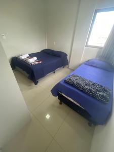 03 quartos (ar condicionado e ventilador), até 10 pessoas, garagem, atrás do hospital da Unimed apt 202