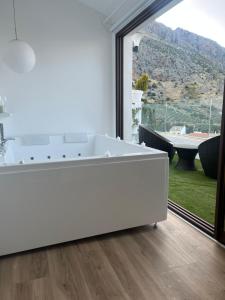 Miramundos Jacuzzi privado y vistas Escapadas románticas en Magina