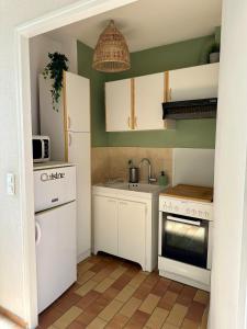 Appartements Studio Cocoon Air conditioning, balcony & lake access : photos des chambres