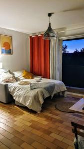 Appartements Studio Cocoon Air conditioning, balcony & lake access : photos des chambres