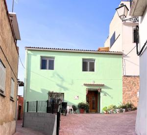 Town House in Old Village Ador, Ganda with big roof terrace with seaview
