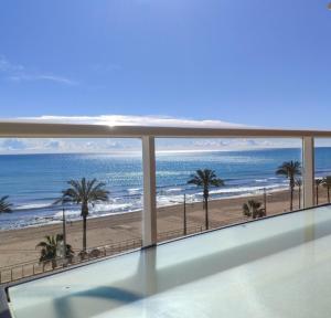 Ático en Primera línea de playa con garaje
