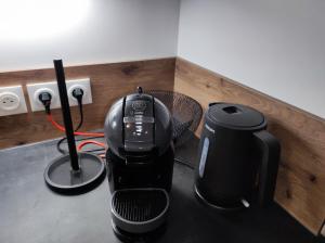 Appartements L-AuthentiCite, jardin et parking au centre-ville : photos des chambres