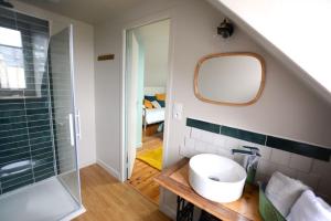 Maisons d'hotes Les Suites Fisel : photos des chambres