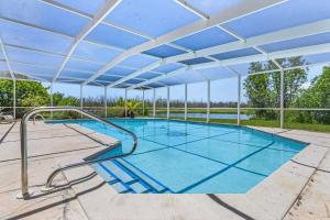 Spacious 4-Bedroom Home with Heated Pool in Sanibel - Sanderling Point - Roelens - 4hvězdičkové hotely ve městě Sanibel