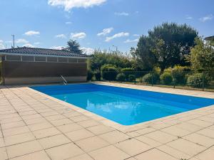 Appartements Appartement Lumineux Avec Balcon et piscine : photos des chambres
