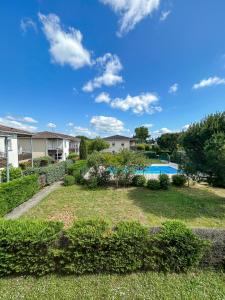 Appartements Appartement Lumineux Avec Balcon et piscine : photos des chambres