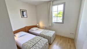 Appartements Vaux sur Mer - LES JARDINS D'AGATHE - VILLA MITOYENNE - marche a pied : photos des chambres